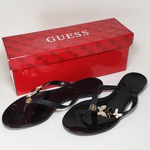 Size 7 Guess Black Flip Flops with Gold Butterflies